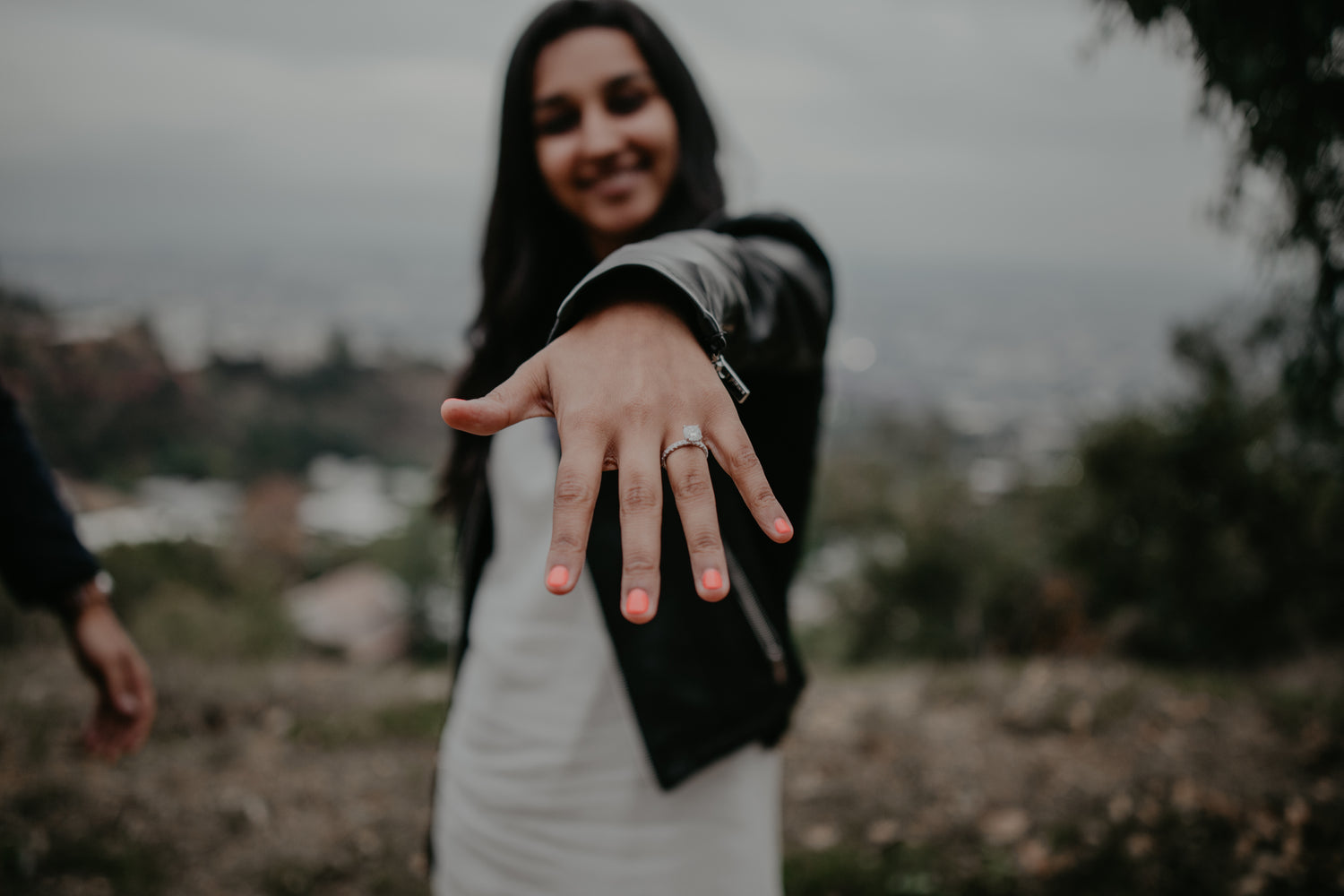 Fifth Alloy engagement ring placed on hand at night